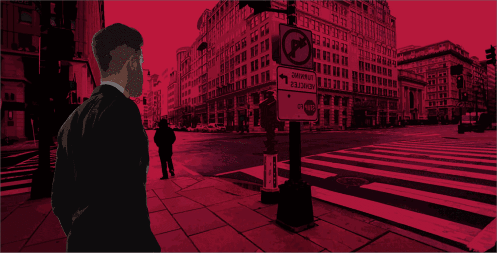 A Digital Product Designer and UX Web Designer in Arizona stands on a city street corner amid crosswalks, buildings, and traffic signs under a red-tinted sky.